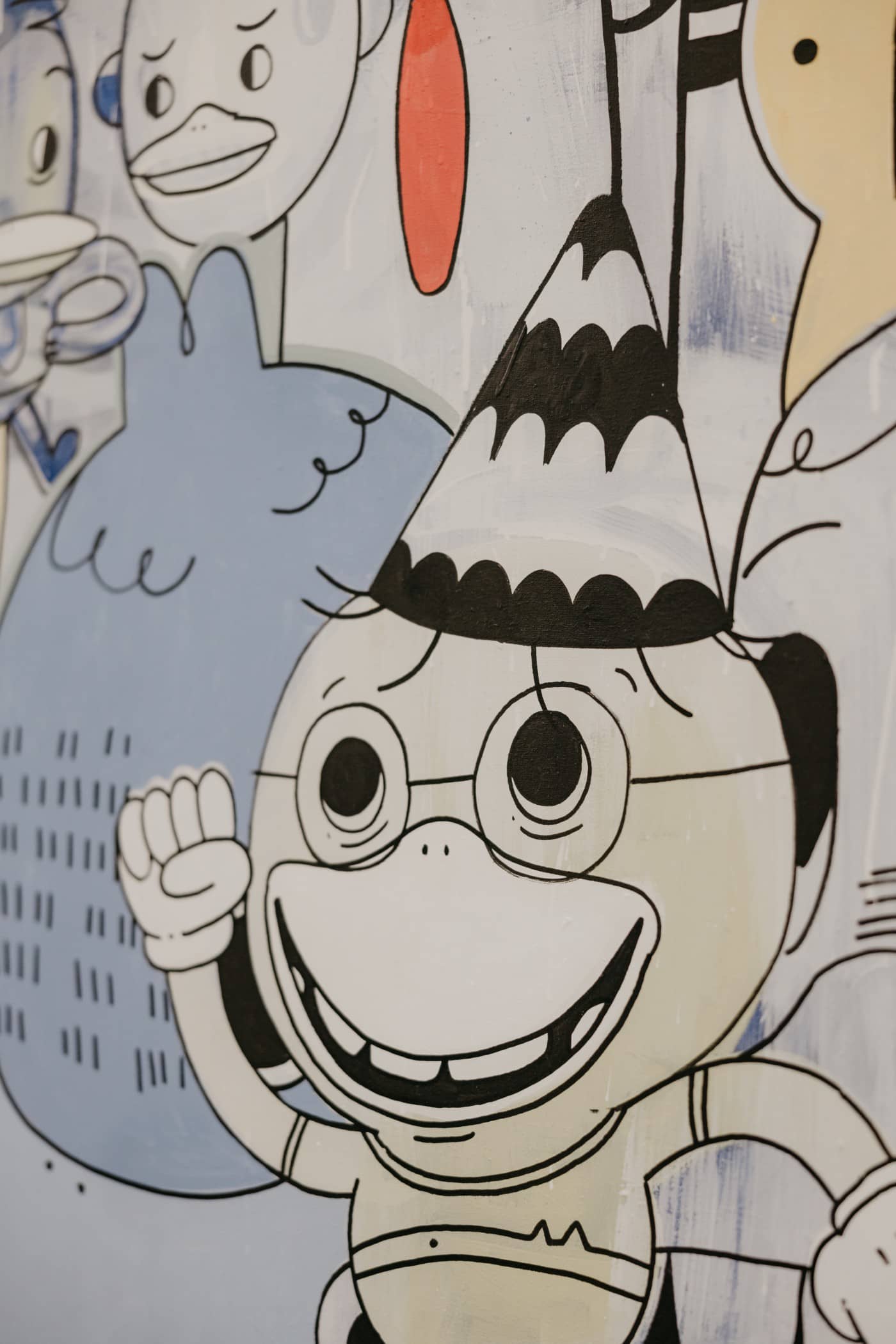 Detalle de personaje de mural artístico