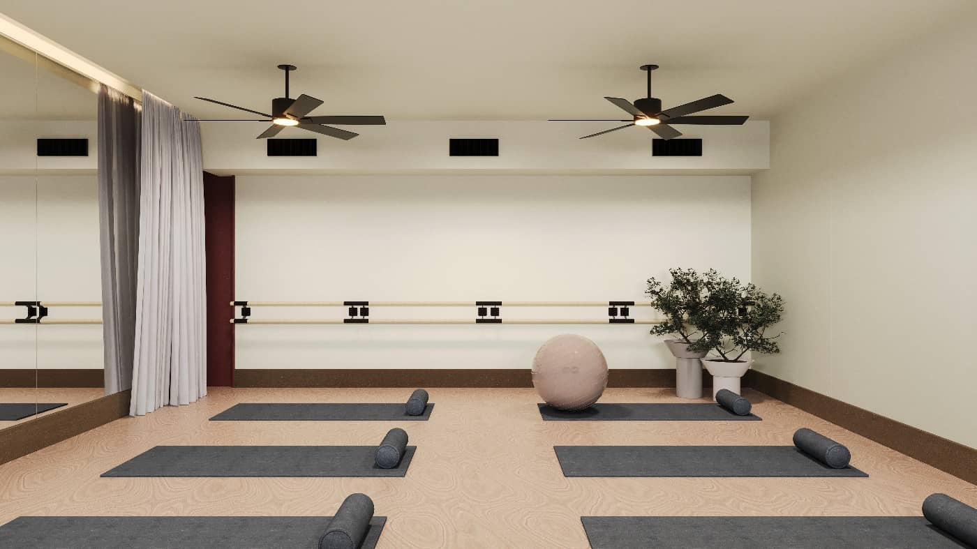 Estudio de pilates con barra y espejos